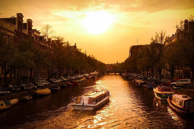 Canal cruise in Amsterdam at dusk