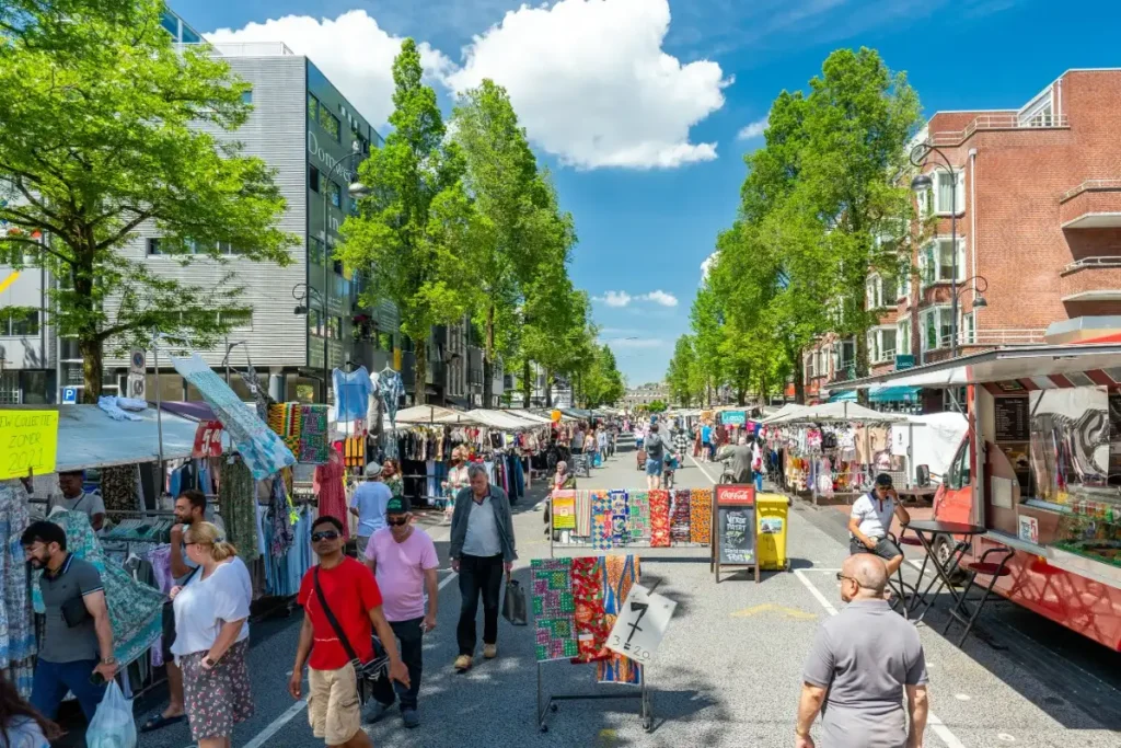 Bright flower stalls and colorful bouquets at Dappermarkt in East Amsterdam